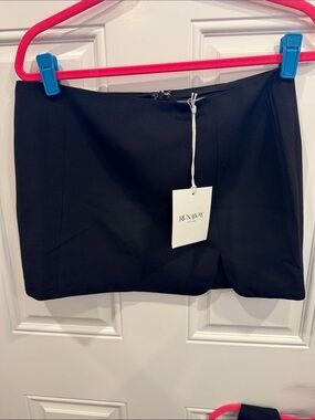 Runaway The Label Black Garment with White Logo Tag